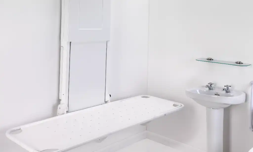 adult changing table and sink in accessible facility